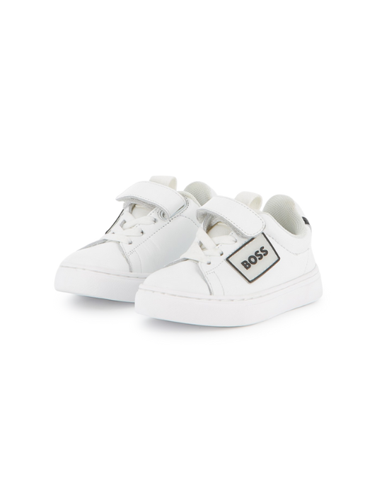 BASKETS EN CUIR DE VACHETTE