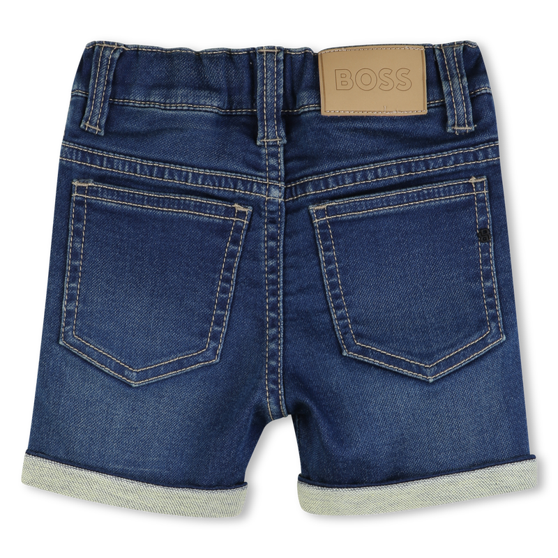 Short en jean PULVÉRISATION DE PIERRE