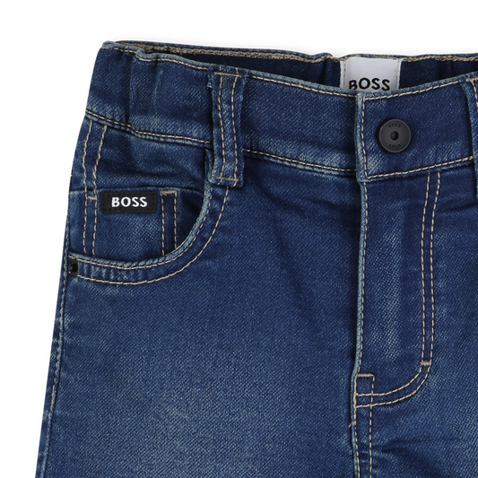 Short en jean PULVÉRISATION DE PIERRE
